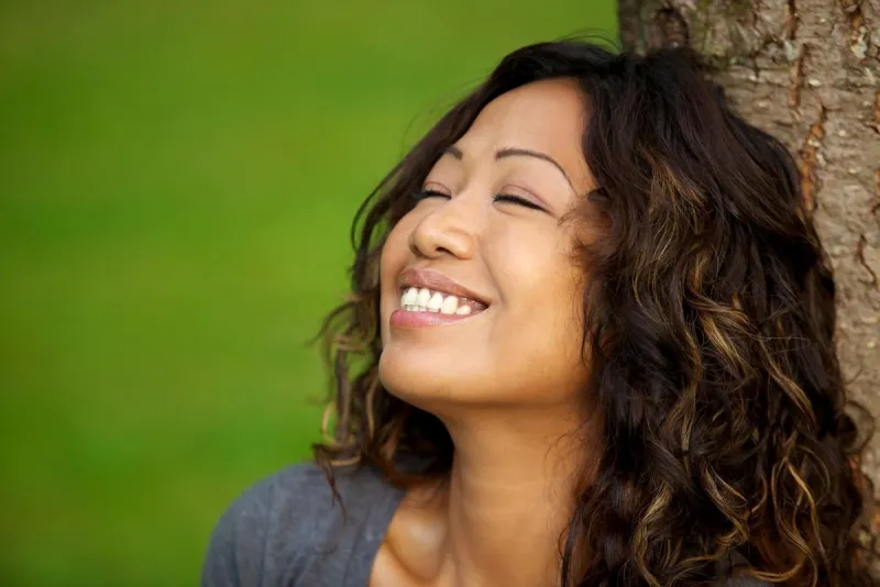 Smiling woman with a bright, confident smile